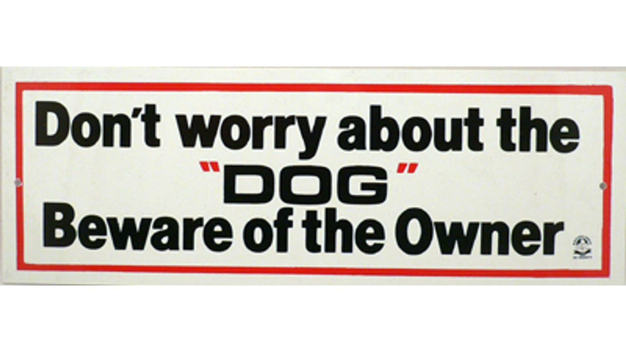 Beware Of The Owner Dog Sign